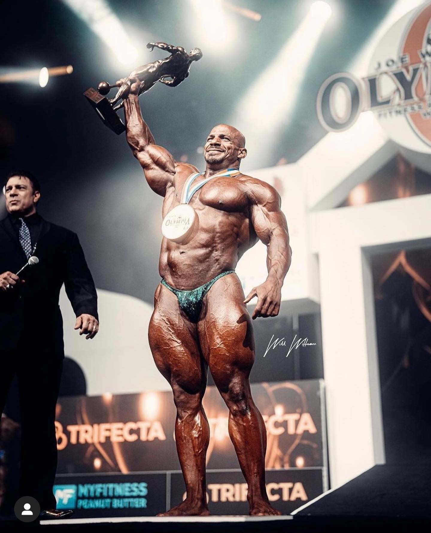 Big Ramy celebrating on the Olympia stage